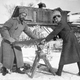 Emperor Nicholas II and his youngest child, Alexei, cutting wood in 1918.